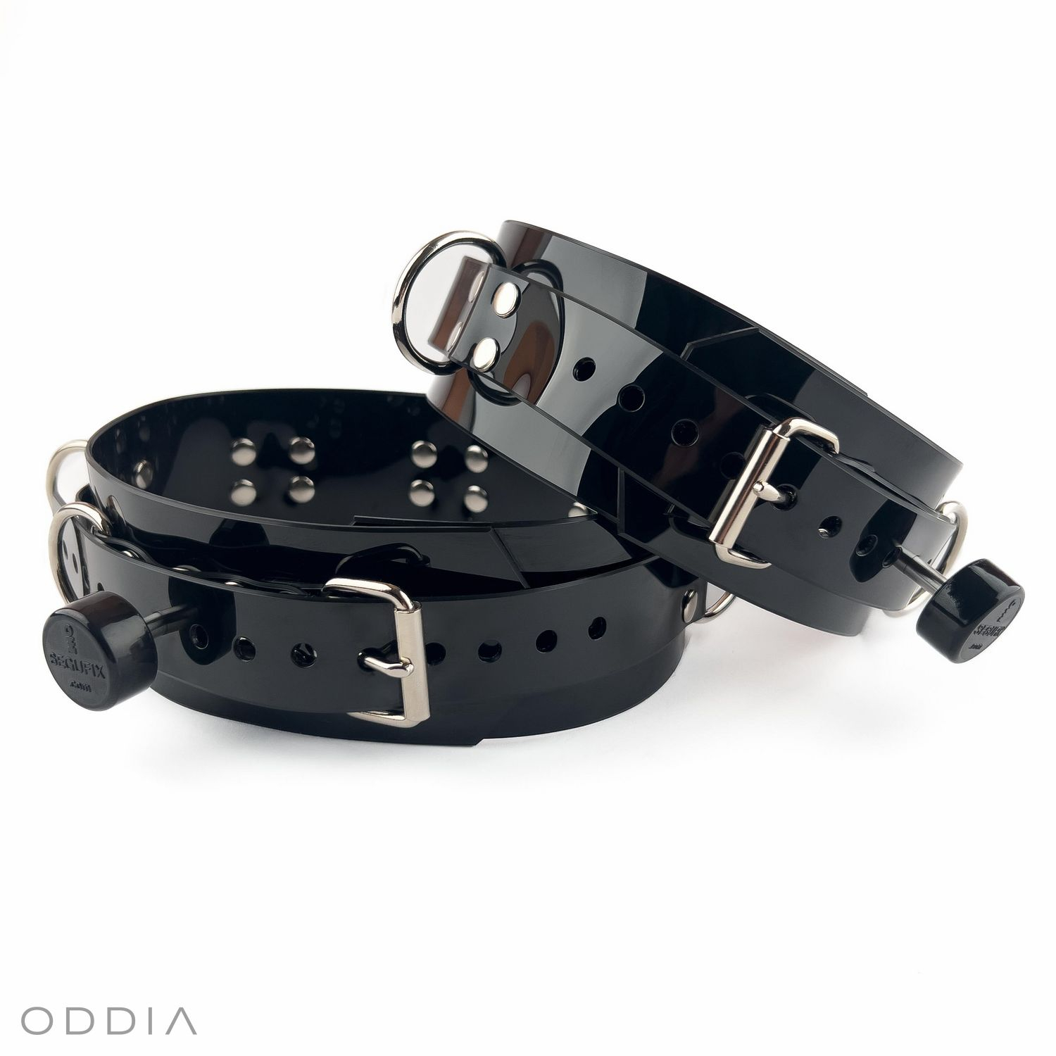 Black locking BDSM thigh restraints with Segufix magnetic locks and high-quality silver-colored metalwork.