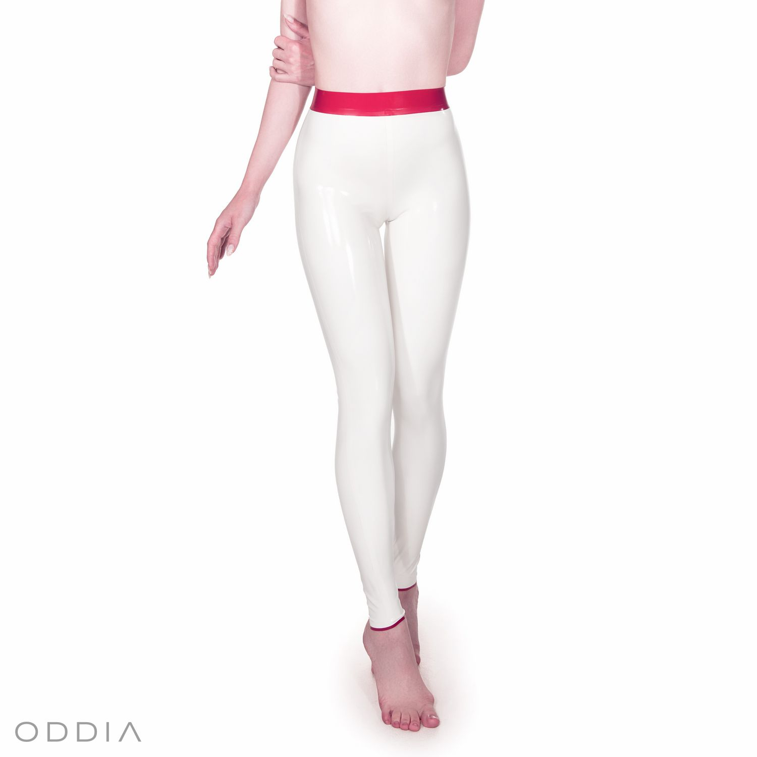 White latex leggings with a red contrasting waistband