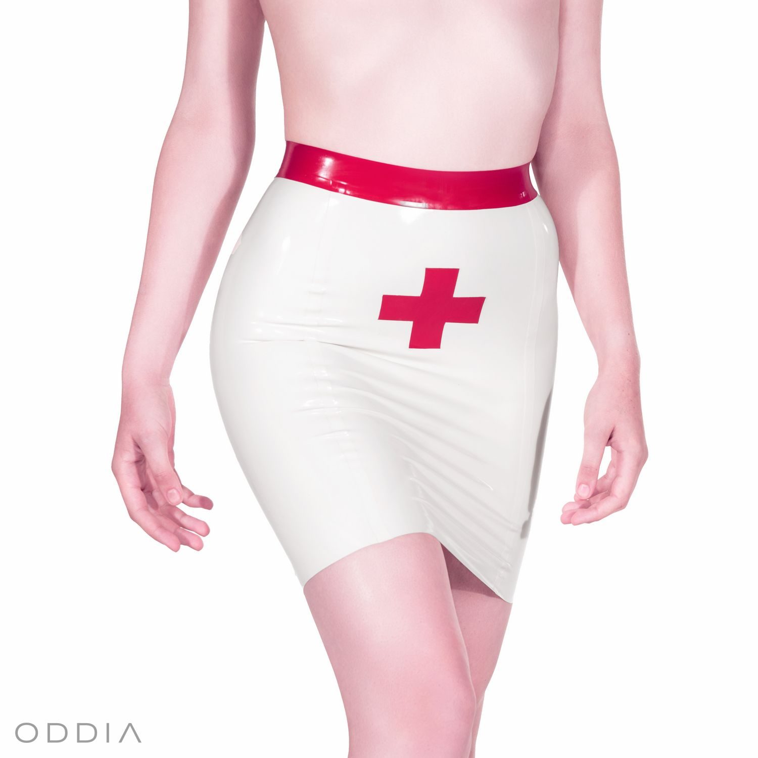 A white tight-fitting latex skirt with red contrasting elements.