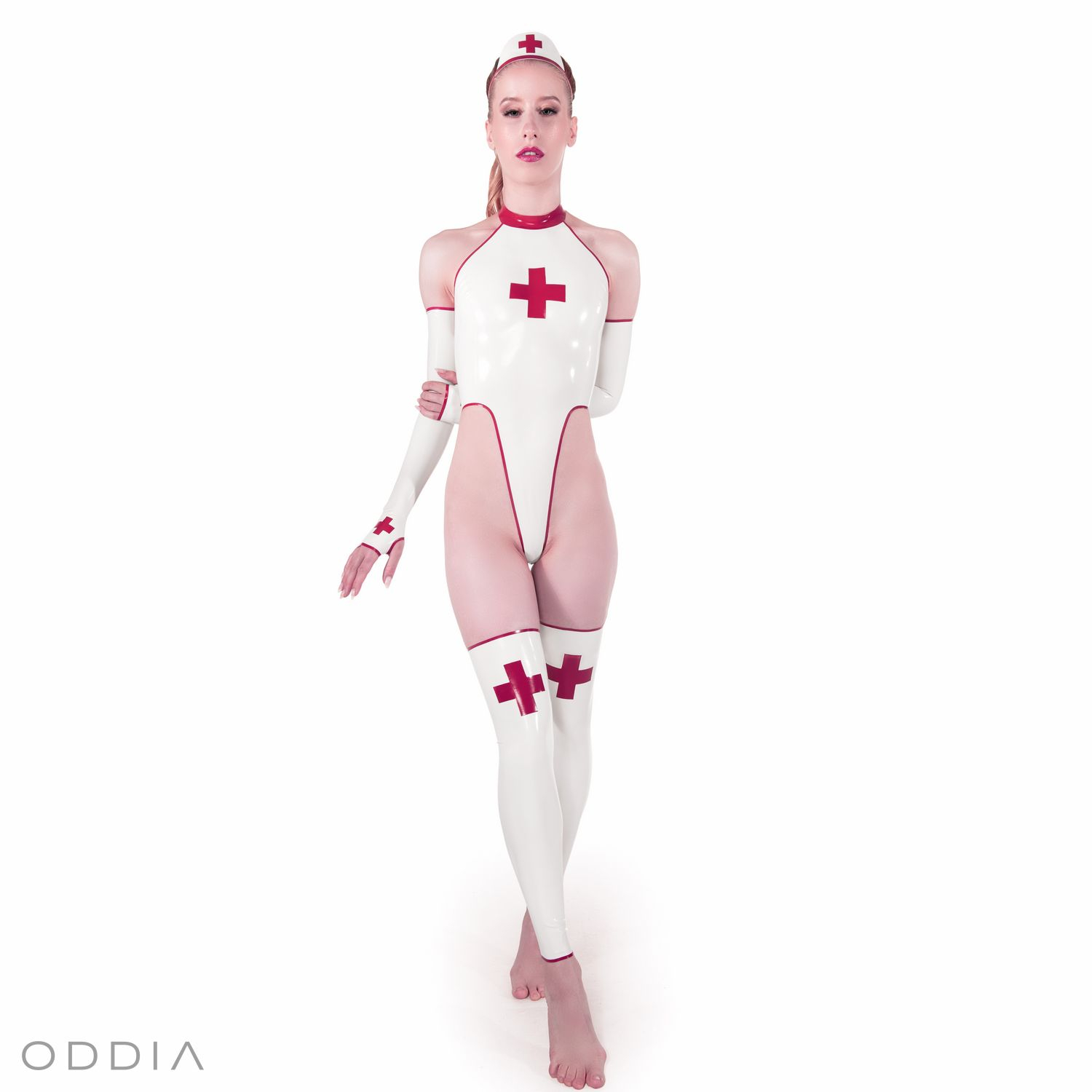A white latex nurse uniform with red elements