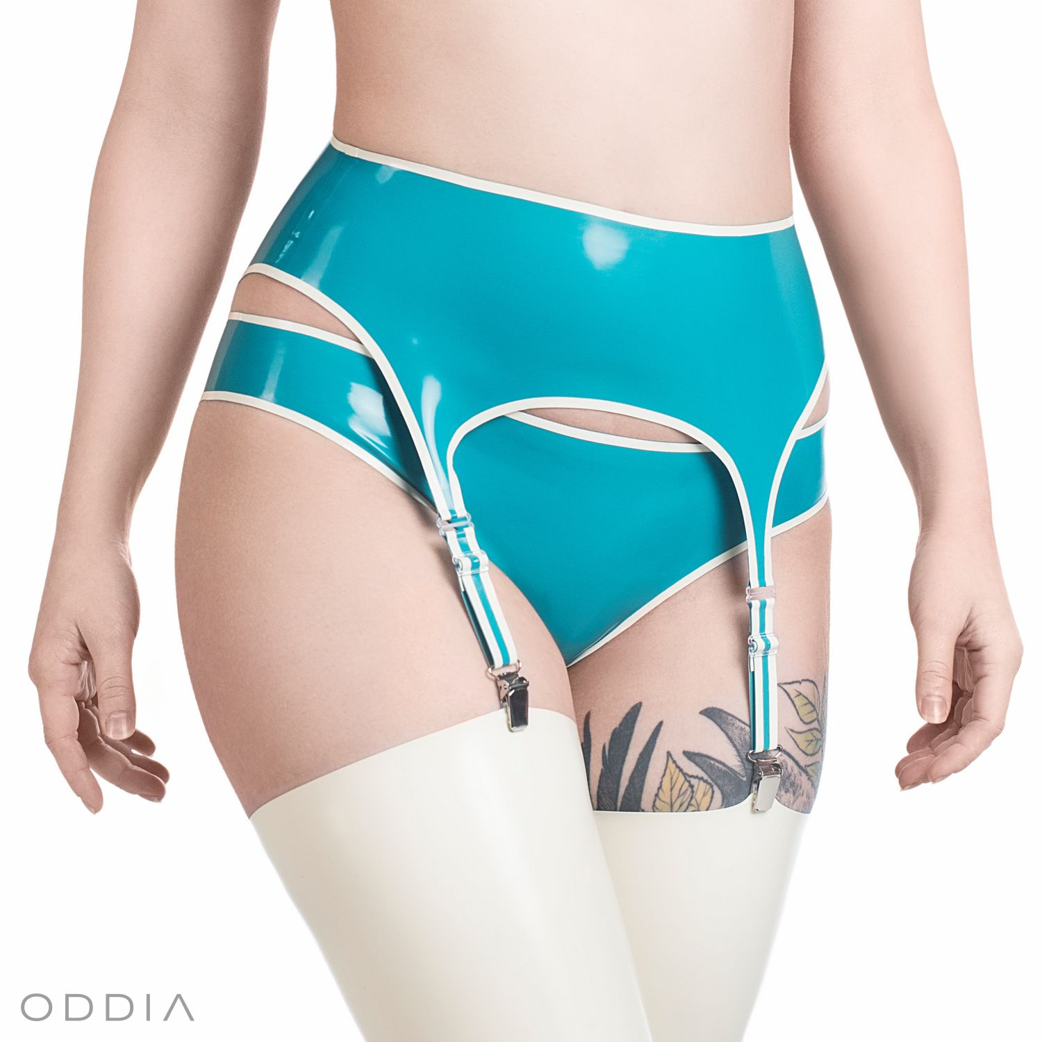 Latex garter belt in turquoise color with a white contrast stripe and four suspenders for attaching stockings